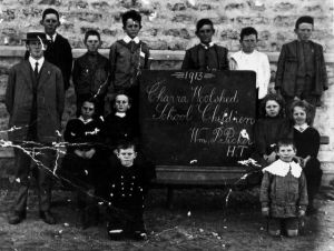 Chara School 1913: Pearl Denton (my mother) is on the right sitting next to the chalk board.