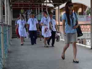 The medical and nursing students wear white uniforms.
