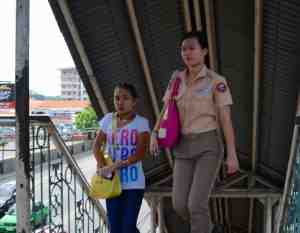 A faculty student uniform, she is studying Criminology.