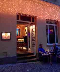 Dining in the lane outside Shrimps Bar in Salzburg